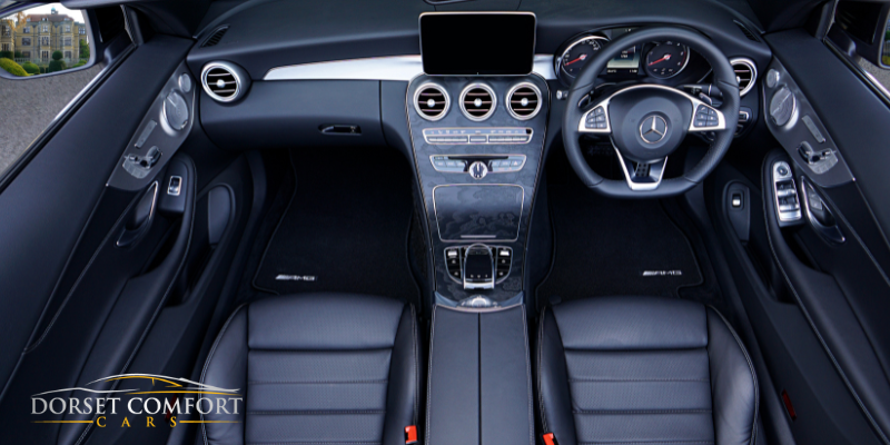 Car interior of a Mercedes seen from above.